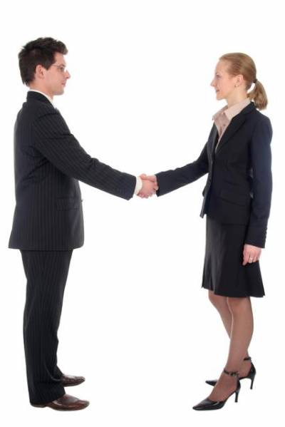 Businesswoman And Businessman Shaking Hands Background
