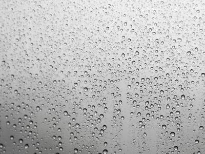 Drop Of Water On The Glass Background