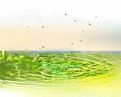 Green, Colorful Spray Of Water Background Thumbnail