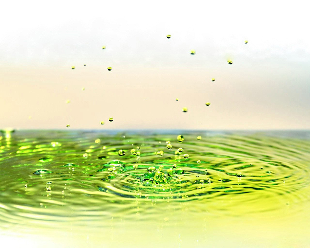 Green, colorful spray of water powerpoint background
