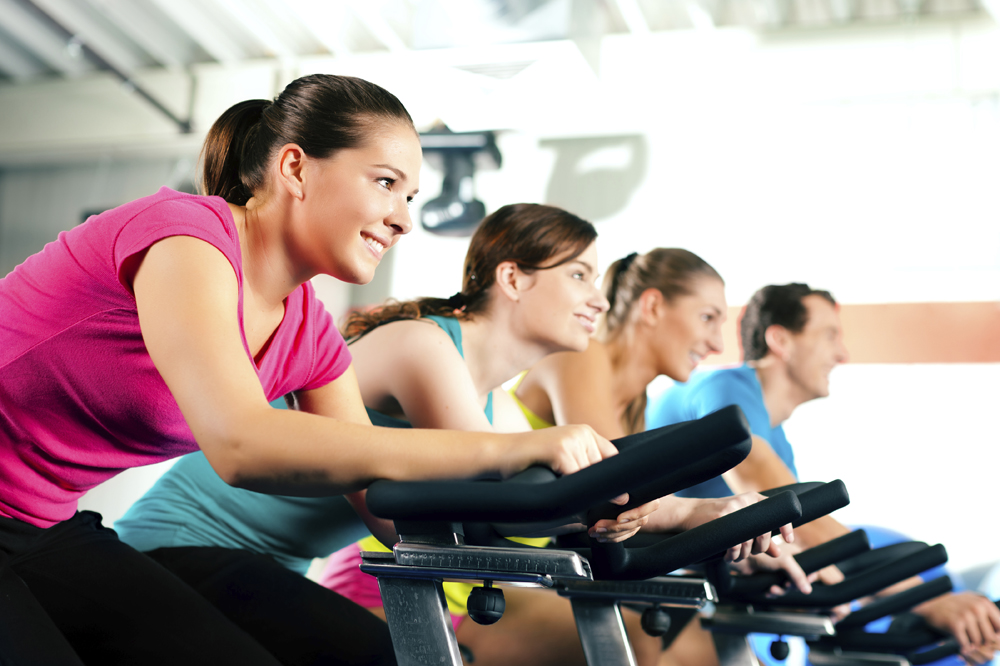 Indoor cycling in gym powerpoint background