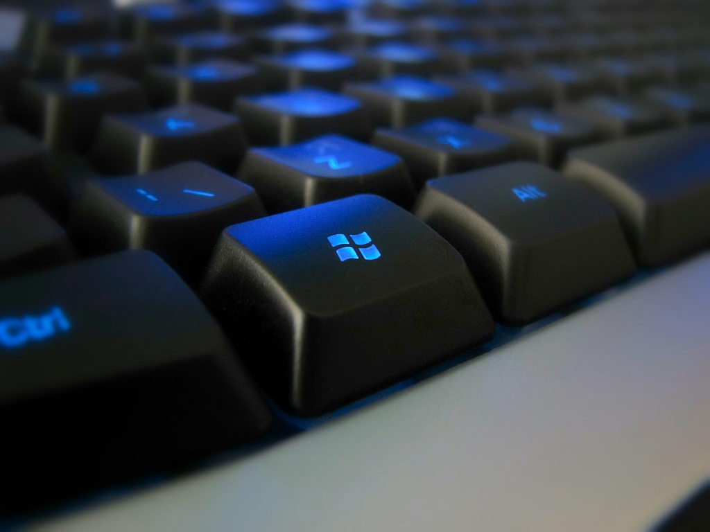 Keyboard with the black Windows button powerpoint background